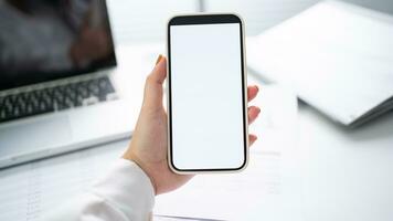 Cropped shot view of Women's hands holding cell telephone blank copy space screen. smart phone with technology concept photo