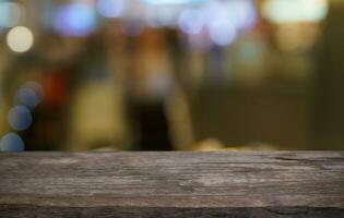 Empty wood table top and blur of out door garden background Empty wooden table space for text marketing promotion. blank wood table copy space for background photo