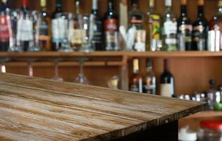 Wood Table Top in Blur Background room interior with empty copy space. photo