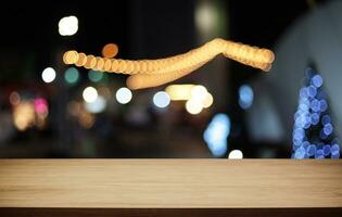 Wood Table Top in Blur Background room interior with empty copy space. photo