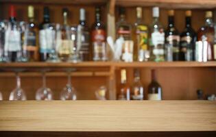 Wood Table Top in Blur Background room interior with empty copy space. photo