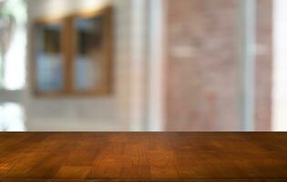 Empty dark wooden table in front of abstract blurred bokeh background of restaurant . can be used for display or montage your products.Mock up for space. photo