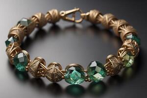 Bracelet with emeralds on a black background close up. photo