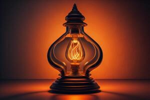 Burning kerosene lamp on orange background. photo