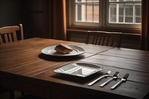 Table setting in a restaurant with plates, cutlery and napkin. photo