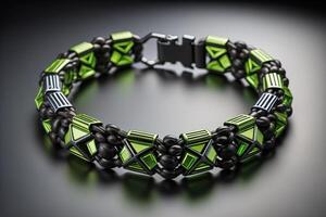 Bracelet made of green glass beads on a black background. photo