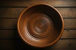 Empty wooden bowl on wooden background. Top view. Copy space. ai generative photo