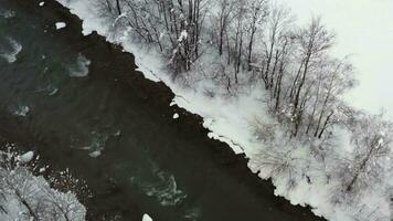 aerial view of a river in the winter video