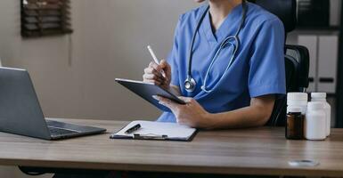 Homecare nursing service and elderly people cardiology healthcare. Close up of young hispanic female doctor nurse check mature caucasian man patient heartbeat using stethoscope during visit photo