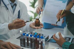 Cropped image of successful medical doctors discussing diagnosis during the conference photo