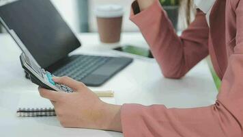 Financial analysts analyze business financial reports on a digital tablet planning investment project during a discussion at a meeting of corporate showing the results of their successful teamwork. video