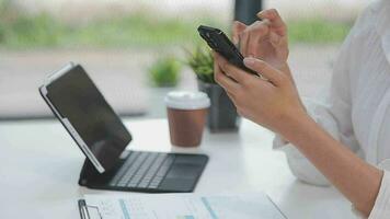 Financial analysts analyze business financial reports on a digital tablet planning investment project during a discussion at a meeting of corporate showing the results of their successful teamwork. video