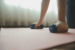 Close up image of attractive fit woman in gym photo