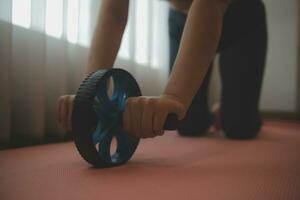 Close up image of attractive fit woman in gym photo