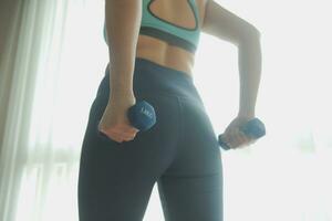 Close up image of attractive fit woman in gym photo