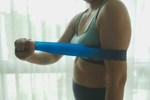 Close up image of attractive fit woman in gym photo