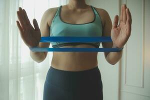 Close up image of attractive fit woman in gym photo