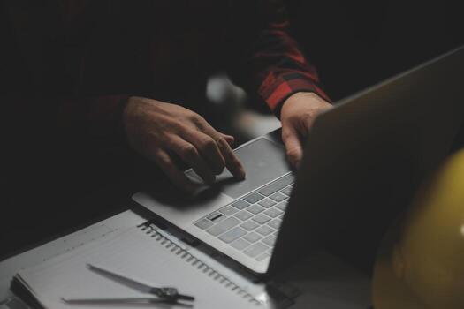 Engineer Teamwork Meeting, Drawing working on blueprint meeting for project working with partner on model building and engineering tools in working site, Construction and structure concept. photo