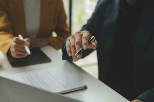 Financial Business team present. Business man hands hold documents with financial statistic stock photo, discussion, and analysis report data the charts and graphs. Finance Financial concept photo