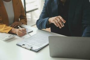Financial Business team present. Business man hands hold documents with financial statistic stock photo, discussion, and analysis report data the charts and graphs. Finance Financial concept photo