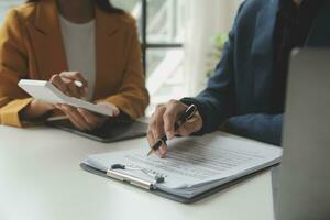 Financial Business team present. Business man hands hold documents with financial statistic stock photo, discussion, and analysis report data the charts and graphs. Finance Financial concept photo