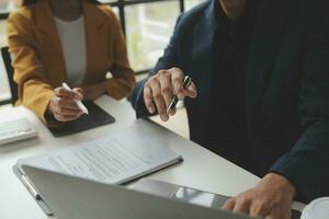 Financial Business team present. Business man hands hold documents with financial statistic stock photo, discussion, and analysis report data the charts and graphs. Finance Financial concept photo