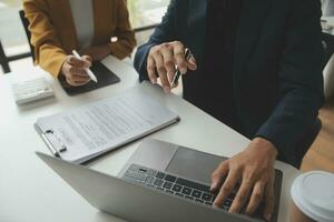 Financial Business team present. Business man hands hold documents with financial statistic stock photo, discussion, and analysis report data the charts and graphs. Finance Financial concept photo