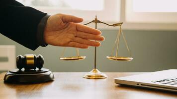 Businessman shaking hands to seal a deal with his partner lawyers or attorneys discussing a contract agreement photo