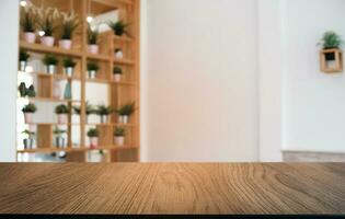 Empty dark wooden table in front of abstract blurred bokeh background of restaurant . can be used for display or montage your products.Mock up for space. photo