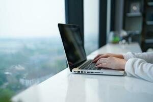 Business man working with laptop. Young business man thinking Concentrated at work. photo