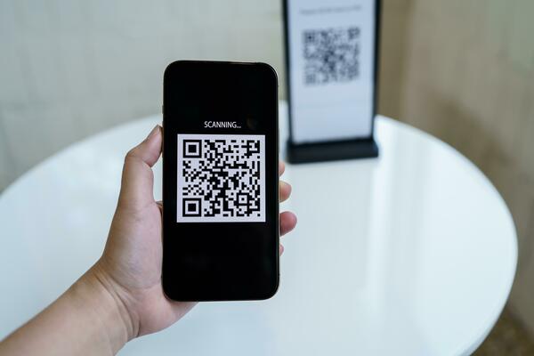 Qr code payment. E wallet. Man scanning tag accepted generate digital pay without money.scanning QR code online shopping cashless payment and verification technology concept.