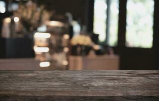 Wood Table Top in Blur Background room interior with empty copy space. photo