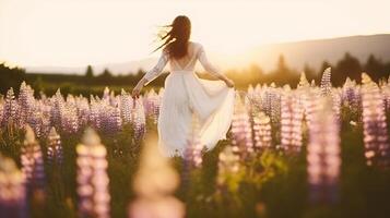 A beautiful bride in wedding dress dancing alone in field of lupine flowers on sunset. Generative AI photo