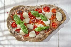 Pizza with whole wheat flour photo