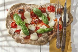 Pizza with whole wheat flour photo