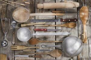 a bunch of different utensils on a table photo