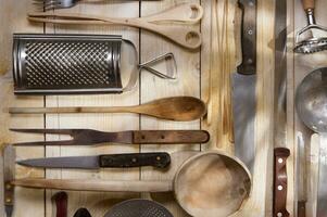 a bunch of different utensils on a table photo