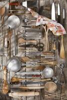 a bunch of different utensils on a table photo