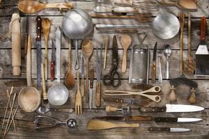 a bunch of different utensils on a table photo