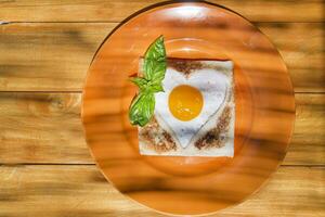 breakfast with toast and eggs photo