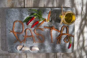 Pasta on a stone for advertising photo