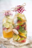 Infusion of tea peach and lemon photo