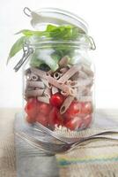 Pasta with tomato sauce and basil photo