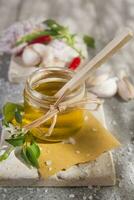 Olive oil, garlic and chili photo