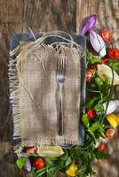 a plate with a fork and knife on it photo