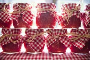 Small jars of tomato sauce photo