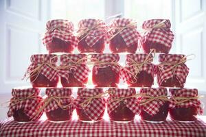 Small jars of tomato sauce photo