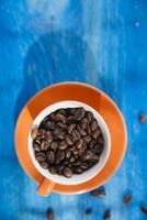 coffee beans on a blue table photo