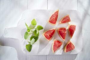 Slices of red grapefruit photo