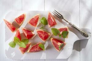 Slices of red grapefruit photo